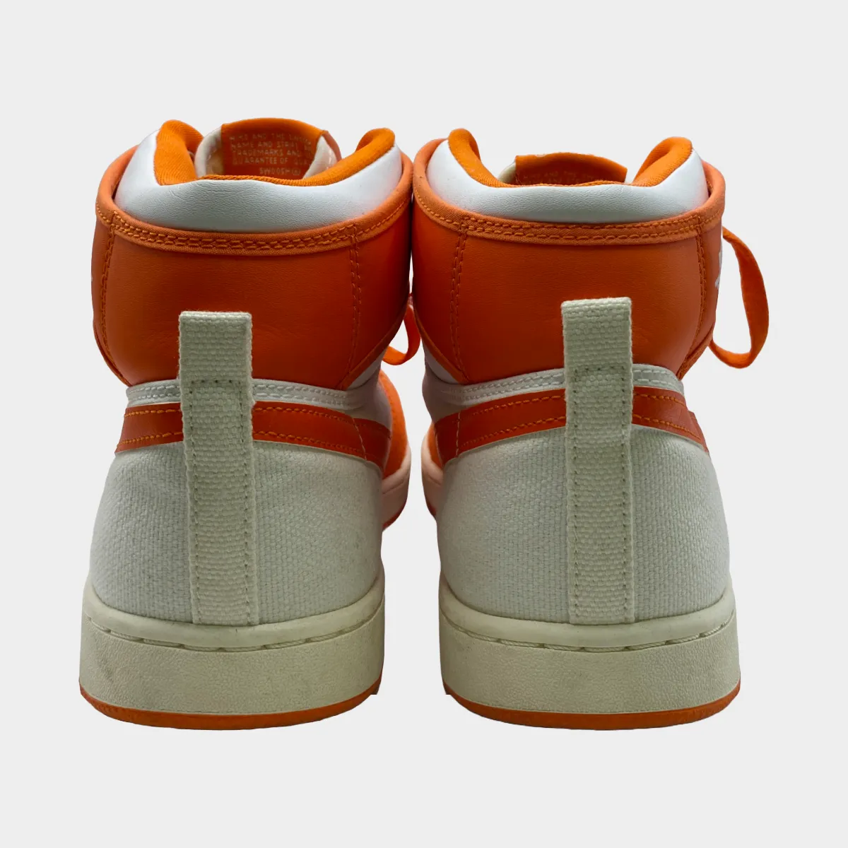 Nike men's orange and white Air Jordan 1 AJKO high top trainers