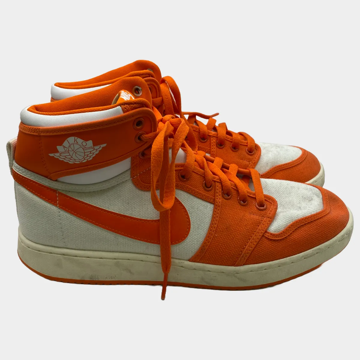 Nike men's orange and white Air Jordan 1 AJKO high top trainers